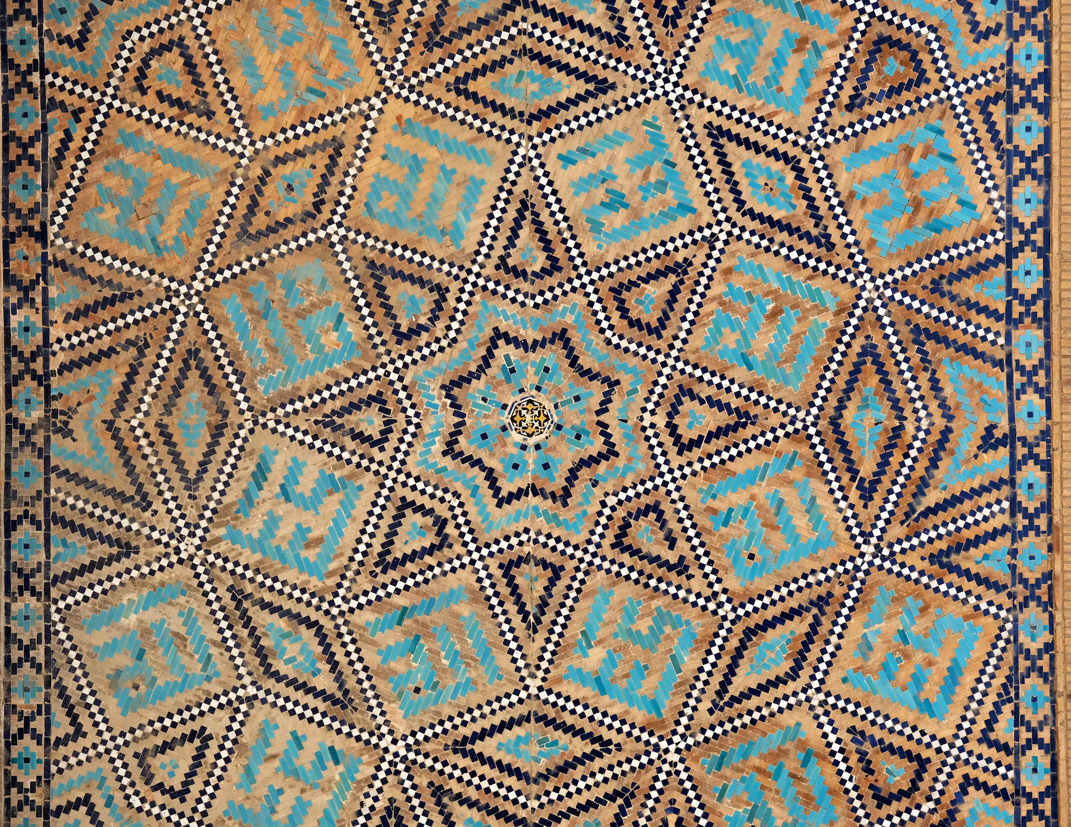 Stellate mosaic in bannai style with kufic script spelling God in turquoise tiles — Ulugh Beg Madrasa, Samarkand, Timurid period, 1421, photograph by Mete Kutlu 2024
